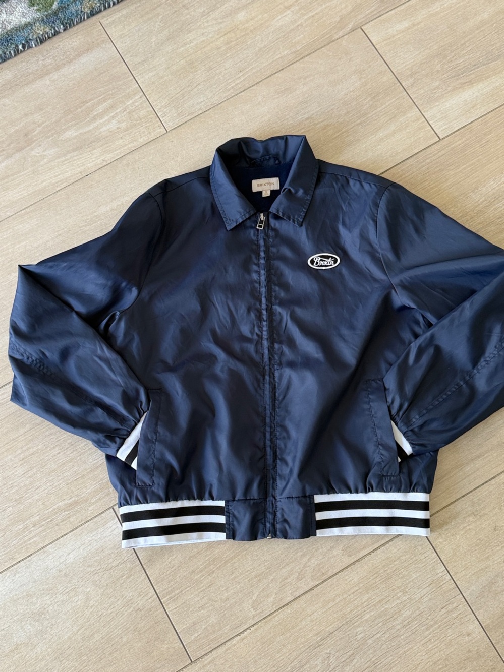 Brixton Navy Bomber Jacket with Striped Hem